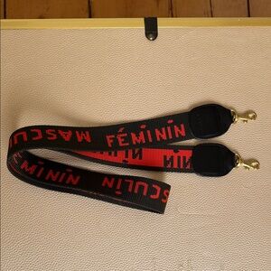 Clare V dark green/black Strap with orange-red Woven Text and Gold Hardware